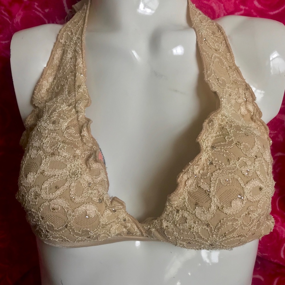 Beige fringe triangle top.